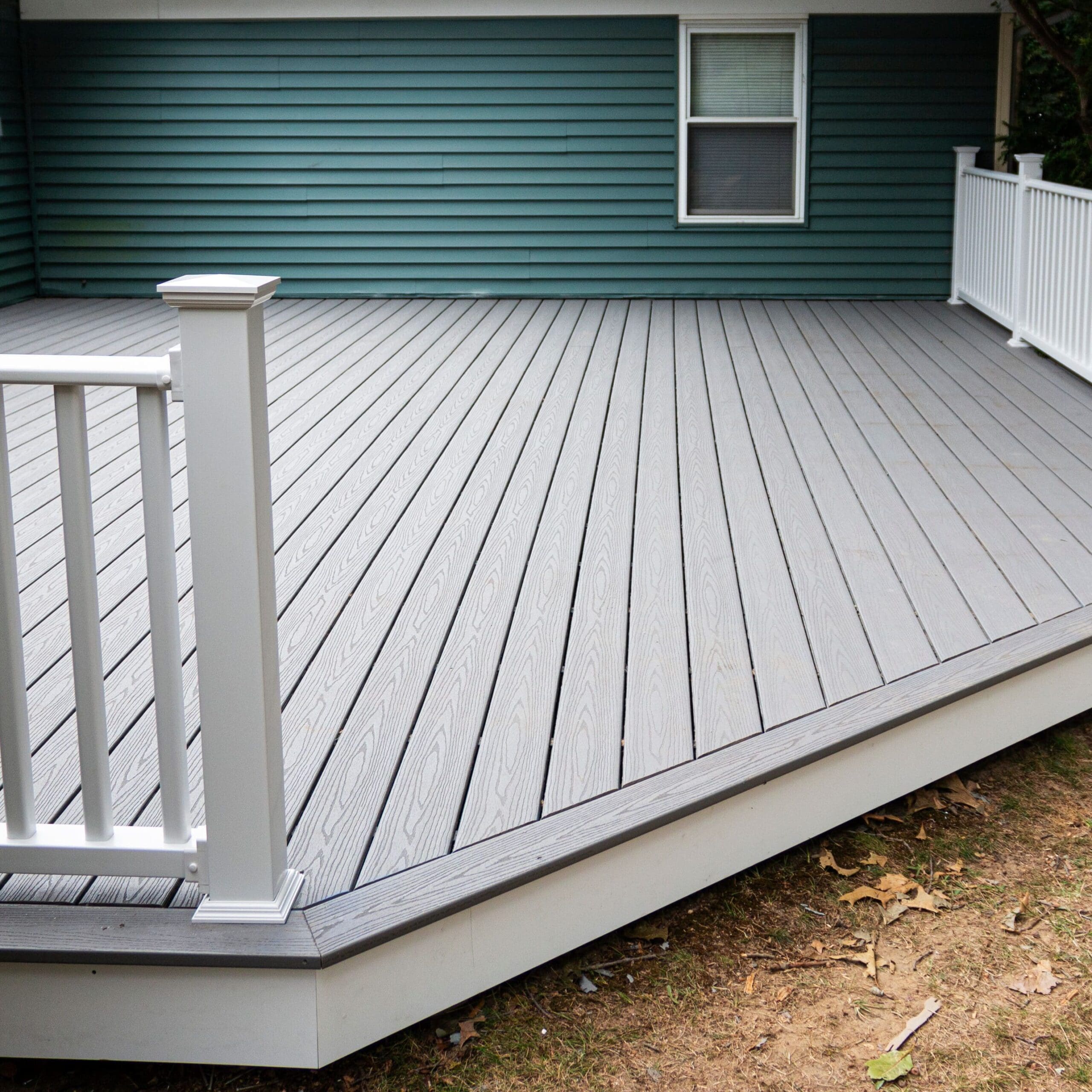New composite deck on the back of a house